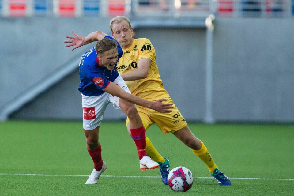 Vålerengas Magnus Retsius Grødem (t.v) i duell med Glimts Vegard Leikvoll Moberg under eliteseriekampen i fotball mellom Vålerenga og Bodø/Glimt på Intility Arena i 2018.