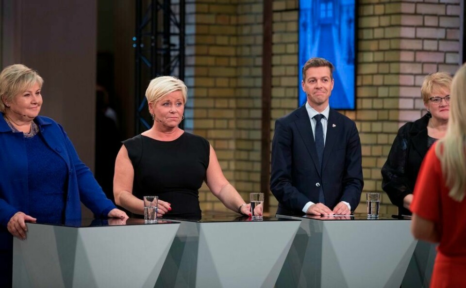 Partilederne Erna Solberg (H), Siv Jensen (Frp), Knut Arild Hareide (KrF) og Trine Skei Grande (V) i Vandrehallen under partilederdebatten på Stortinget etter valgseieren mandag.