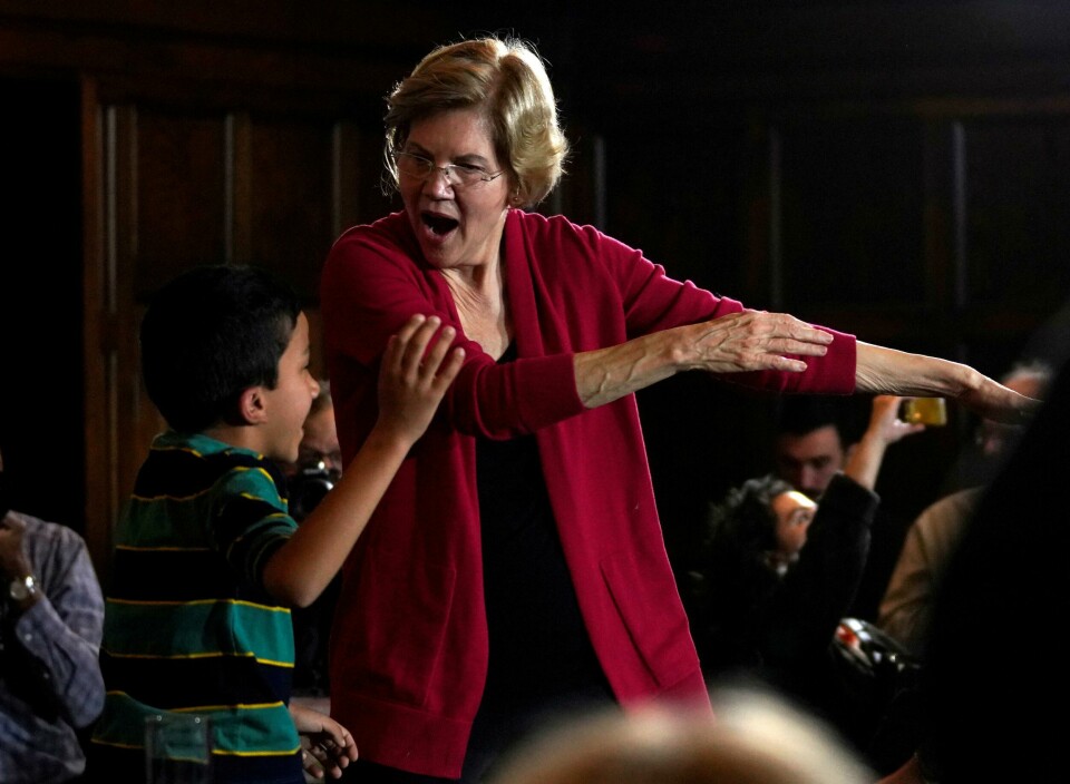 Democratic 2020 U.S. presidential candidate and U.S. Senator Elizabeth Warren (D-MA) dances with a boy at a campaign event in Ames, Iowa, U.S., February 2, 2020. REUTERS/Rick Wilking TPX IMAGES OF THE DAY Democratic 2020 U.S. presidential candidate and U.S. Senator Elizabeth Warren (D-MA) dances with a boy at a campaign event in Ames, Iowa, U.S., February 2, 2020. REUTERS/Rick Wilking TPX IMAGES OF THE DAY