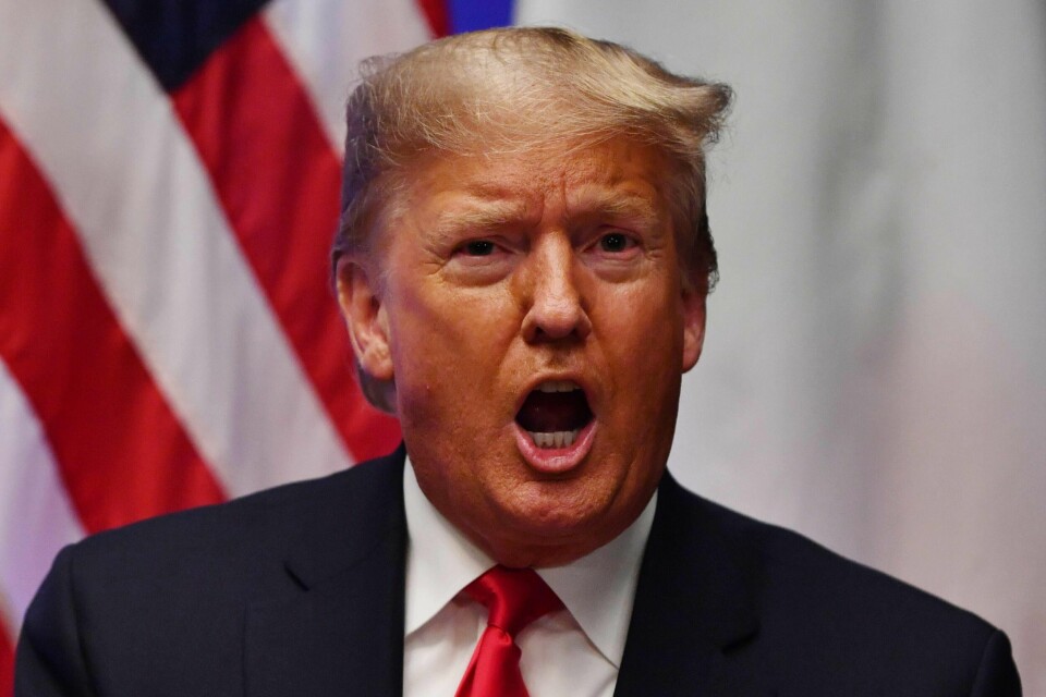 US President Donald Trump speaks during a bilateral meeting with Italy's Prime Minister Giuseppe Conte (unseen) at the NATO summit at the Grove hotel in Watford, northeast of London on December 4, 2019. (Photo by Nicholas Kamm / AFP)