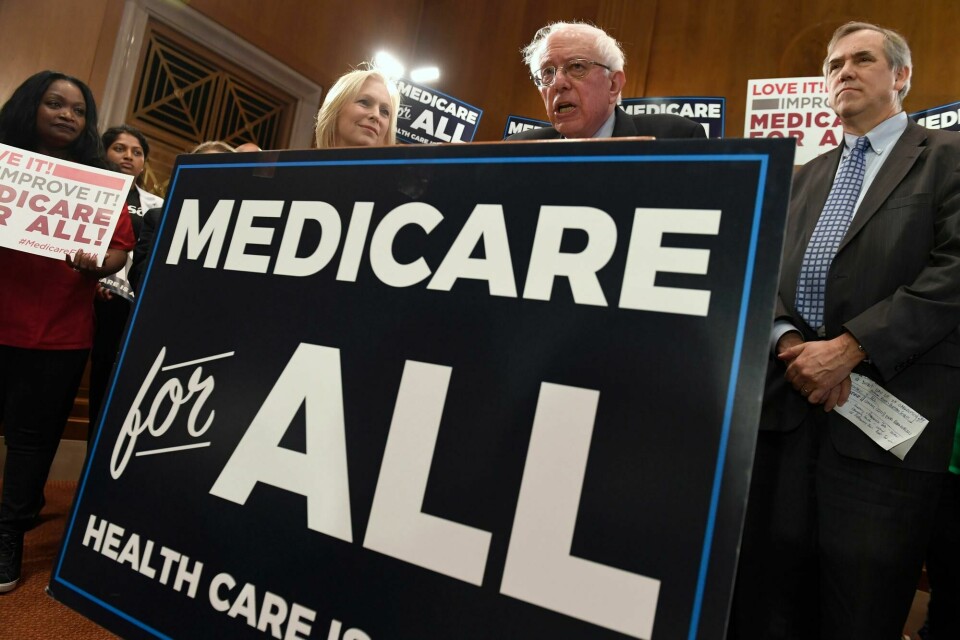 Sen. Bernie Sanders, I-Vt., second from right, speaks during a news conference on Capitol Hill in Washington, Wednesday, April 10, 2019, to reintroduce his 'Medicare for All' legislation to create a government-run health insurance plan. Sanders is flanked by Sen. Kirsten Gillibrand, D-N.Y., left, and Sen. Jeff Merkley, D-Ore., right. (AP Photo/Susan Walsh) Sen. Bernie Sanders, I-Vt., second from right, speaks during a news conference on Capitol Hill in Washington, Wednesday, April 10, 2019, to reintroduce his 'Medicare for All' legislation to create a government-run health insurance plan. Sanders is flanked by Sen. Kirsten Gillibrand, D-N.Y., left, and Sen. Jeff Merkley, D-Ore., right. (AP Photo/Susan Walsh)