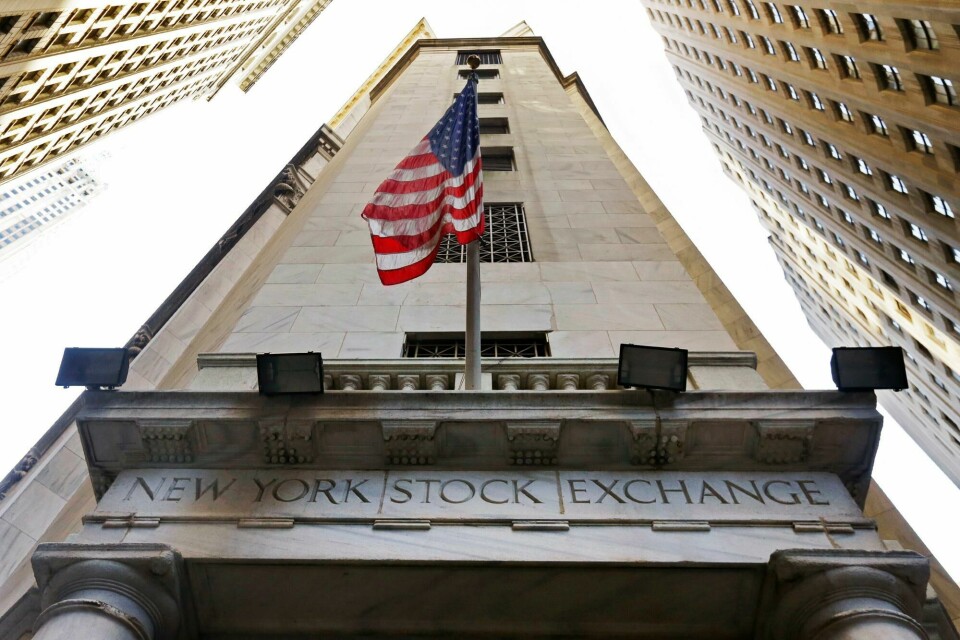 FILE - In this Friday, Nov. 13, 2015, file photo, the American flag flies above the Wall Street entrance to the New York Stock Exchange. U.S. stocks slipped early Tuesday, Aug. 16, 2016, as investors continued to sell phone company and utility stocks. Materials companies are the exception, as they?Äôre trading higher as the dollar weakens. Investors are also sifting through reports that showed inflation remained weak in July, but home building and factory production improved. (AP Photo/Richard Drew, File) FILE - In this Friday, Nov. 13, 2015, file photo, the American flag flies above the Wall Street entrance to the New York Stock Exchange. U.S. stocks slipped early Tuesday, Aug. 16, 2016, as investors continued to sell phone company and utility stocks. Materials companies are the exception, as they?Äôre trading higher as the dollar weakens. Investors are also sifting through reports that showed inflation remained weak in July, but home building and factory production improved. (AP Photo/Richard Drew, File)