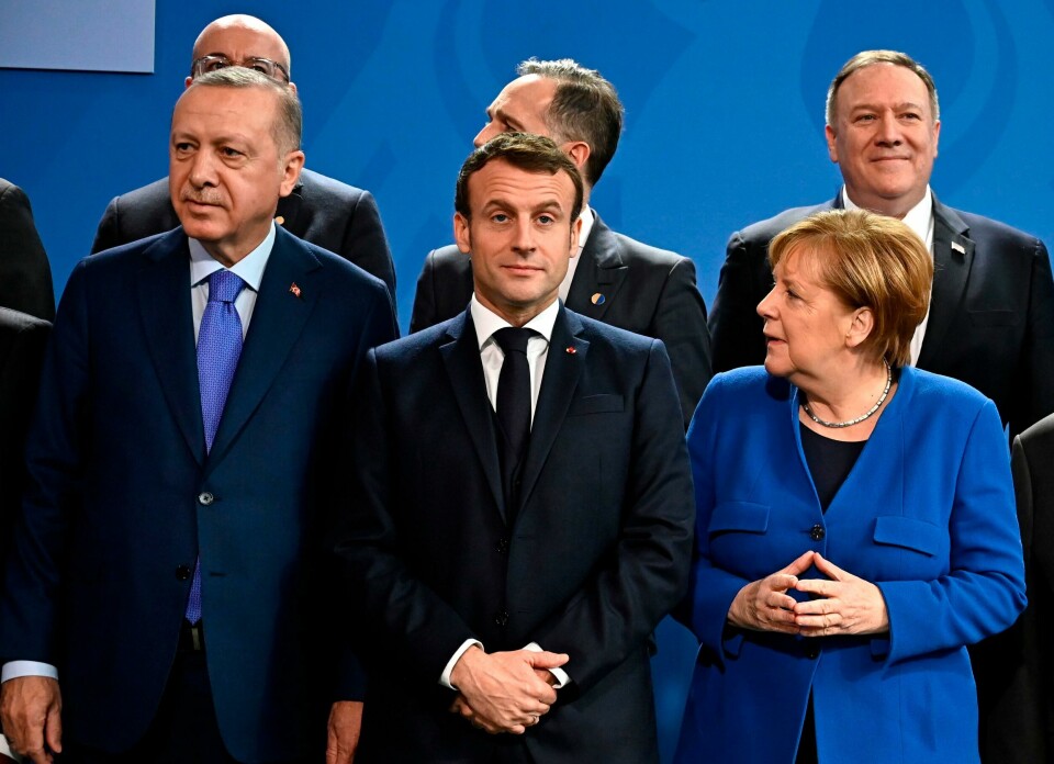 (Front row, L to R) Turkish President Recep Tayyip Erdogan, French President Emmanuel Macron, German Chancellor Angela Merkel, (second row, L to R) European Council President Charles Michel, German Foreign Minister Heiko Maas and US Secretary of State Mike Pompeo pose for a family picture during a Peace summit on Libya at the Chancellery in Berlin, on January 19, 2020. - World leaders gather in Berlin on January 19, 2020 to make a fresh push for peace in Libya, in a desperate bid to stop the conflict-wracked nation from turning into a 'second Syria'. Chancellor Angela Merkel will be joined by the presidents of Russia, Turkey and France and other world leaders for talks held under the auspices of the United Nations. (Photo by Tobias SCHWARZ / AFP) (Front row, L to R) Turkish President Recep Tayyip Erdogan, French President Emmanuel Macron, German Chancellor Angela Merkel, (second row, L to R) European Council President Charles Michel, German Foreign Minister Heiko Maas and US Secretary of State Mike Pompeo pose for a family picture during a Peace summit on Libya at the Chancellery in Berlin, on January 19, 2020. - World leaders gather in Berlin on January 19, 2020 to make a fresh push for peace in Libya, in a desperate bid to stop the conflict-wracked nation from turning into a 'second Syria'. Chancellor Angela Merkel will be joined by the presidents of Russia, Turkey and France and other world leaders for talks held under the auspices of the United Nations. (Photo by Tobias SCHWARZ / AFP)
