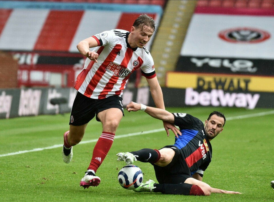 Sander Berge i duell med Luka Milivojevic. Foto: Rui Vieira / AP / NTB Sander Berge i duell med Luka Milivojevic. Foto: Rui Vieira / AP / NTB