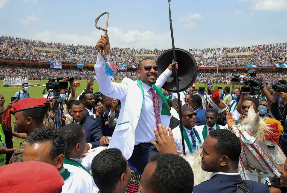 Etiopias statsminister og tidligere vinner av Nobels fredspris, Abiy Ahmed, under et valgmøte 16. juni. Det avholdes valg i Etiopia mandag. Etiopias statsminister og tidligere vinner av Nobels fredspris, Abiy Ahmed, under et valgmøte 16. juni. Det avholdes valg i Etiopia mandag.