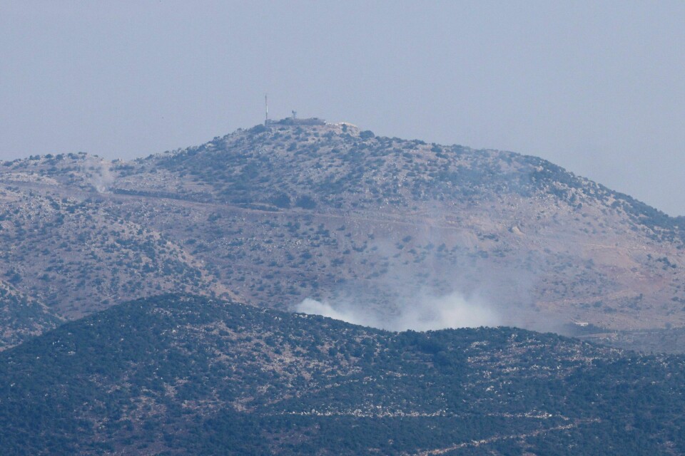 Bildet viser røykskyer i Libanon 14. oktober. Hizbollah er en sterk støttespiller av Hamas, og siden sistnevntes angrep mot Israel har det også vært en rekke trefninger mellom Hizbollah og israelske styrker. Bildet viser røykskyer over området ved Shebaa-gårdene i Libanon 14. oktober.