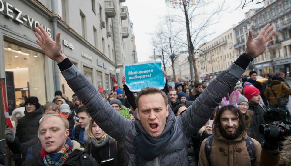 «Jeg er ikke redd», sa Navalnyj til pressen da politiet førte ham bort på flyplassen i Moskva vinteren for tre år siden. Nå er han død. Her er han avbildet i 2018. .