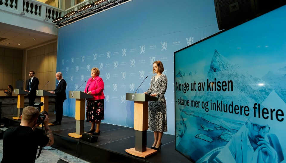 Barne- og familieminister Kjell Ingolf Ropstad (Krf), finansminister Jan Tore Sanner, statsminister Erna Solberg og næringsministeren Iselin Nybø under en pressekonferanse om Norges vei ut av koronakrisen. Foto: Heiko Junge / NTB scanpix