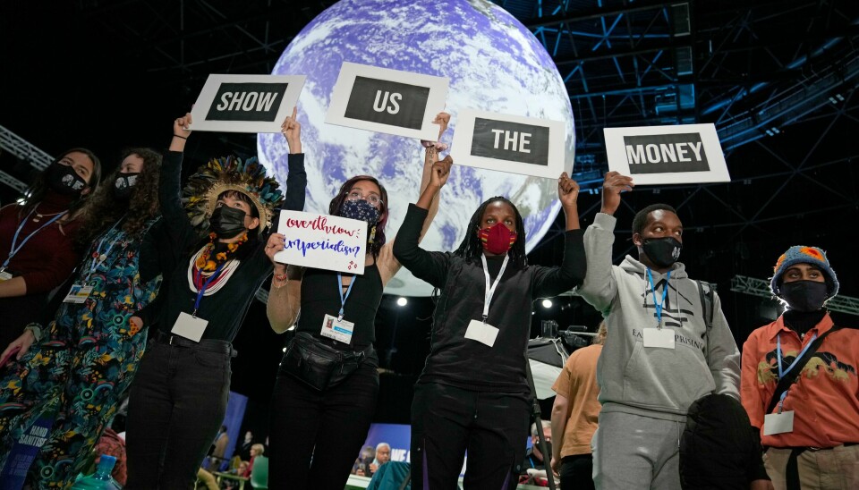 Vis oss pengene er dette kravet fra klimaaktivister under klimatoppmøtet COP26 i Glasgow mandag. Vis oss pengene er dette kravet fra klimaaktivister under klimatoppmøtet COP26 i Glasgow mandag. Foto: Alastair Grant /AP / NTB