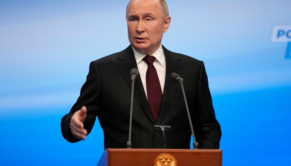 President Vladimir Putin på talerstolen da han holdt sin seierstale søndag kveld. President Vladimir Putin på talerstolen da han holdt sin seierstale søndag kveld. Foto: Aleksander Zemlianitsjenko / AP / NTB