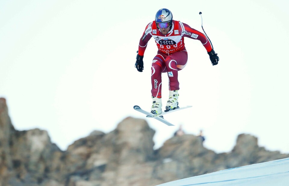 Aksel Lund Svindal på vei ned den isete og krevende utforløypa i Italia tirsdag. FOTO: ALESSANDRO GAROFALO/NTB SCANPIX