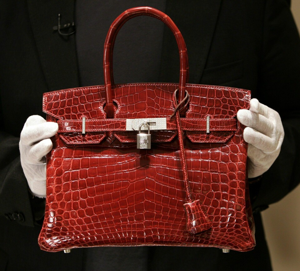 En Birkin-veske i krokodilleskinn er blant de mest eksklusive modellene av statusveska til Hermès. En Birkin-veske i krokodilleskinn er blant de mest eksklusive modellene av statusveska til Hermès.