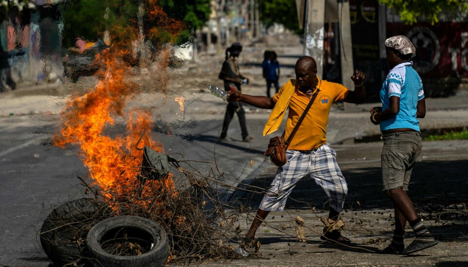Gjengvolden i Haitis hovedstad Port-au-Prince blusset kraftig opp i vinter. Dette bildet er tatt i Champ de Mars-området tidligere denne måneden. Gjengvolden i Haitis hovedstad Port-au-Prince blusset kraftig opp i vinter. Dette bildet er tatt i Champ de Mars-området tidligere denne måneden. Foto: Ramon Espinosa / AP / NTB
