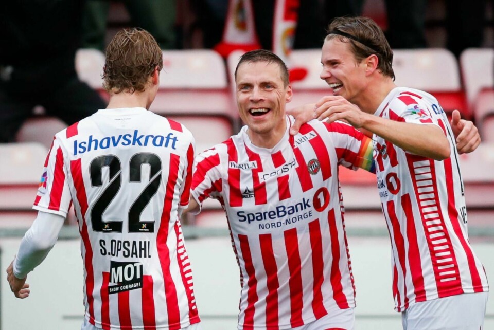 Ruben Yttergård Jenssen smiler etter en scoring for Tromsø i årets sesong. Til sommeren skal han og resten av TIL-laget spille midnattssolkamp. Ruben Yttergård Jenssen sendte Tromsø opp i 2-0. Foto: Rune Stoltz Bertinussen / NTB