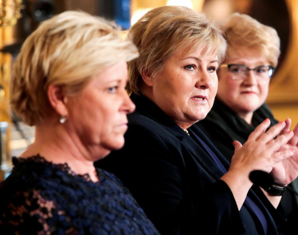 Statsminister Erna Solberg (H) og kulturminister Trine Skei Grande (V) vil sette Norges signatur på FNs migrasjonsavtale. Finansminister Siv Jensen (Frp) har varslet dissens fra Frp i saken.