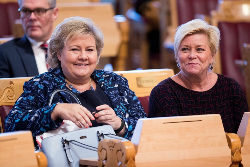 Regjeringen med statsminister Erna Solberg (t.v.) og finansminister Siv Jensen (t.h.) i spissen har lagt fram forslag om å kutte en rekke ytelser til allerede utsatte grupper som av en eller annen grunn har falt utenfor arbeidslivet, skriver Hatem Ben Mansour. FOTO: TERJE PEDERSEN/NTB SCANPIX Oslo 20181004.
Statsminister Erna Solberg (H) under trontaledebatten i Stortinget 2018. Finansminister Siv Jensen (Fr.P) t.h
Foto: Terje Pedersen / NTB scanpix