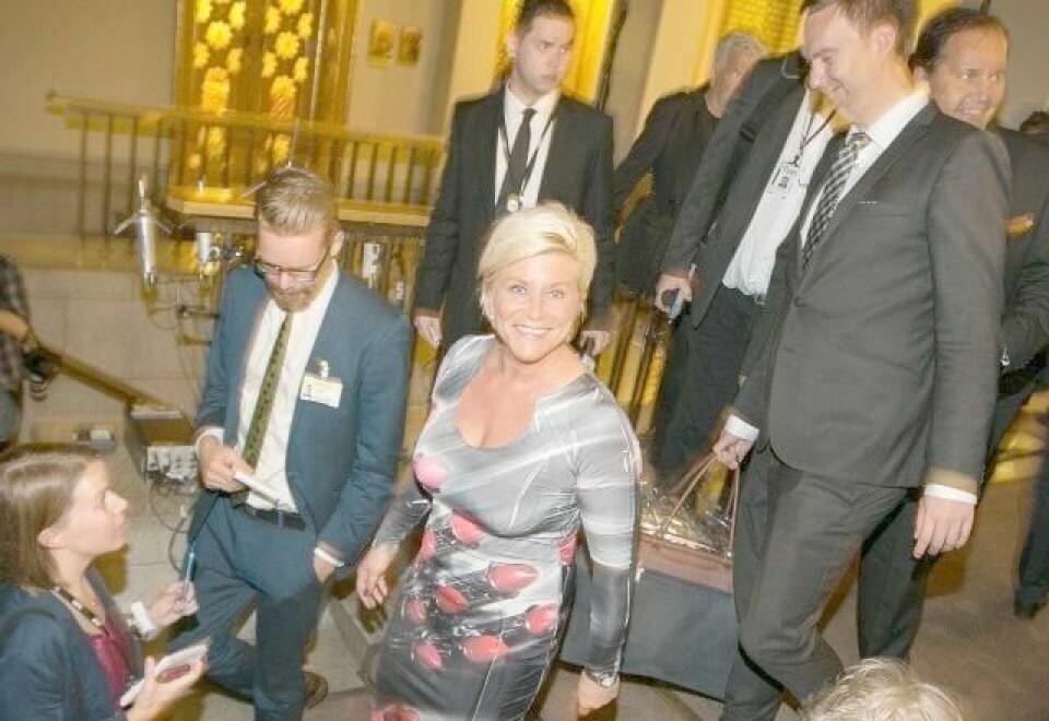Frp-leder Siv Jensen var godt fornøyd med valgresultatet, selv om partiet mistet 12 av 41 representanter på Stortinget. FOTO: AUDUN BRAASTAD/AFP/NTB SCANPIX