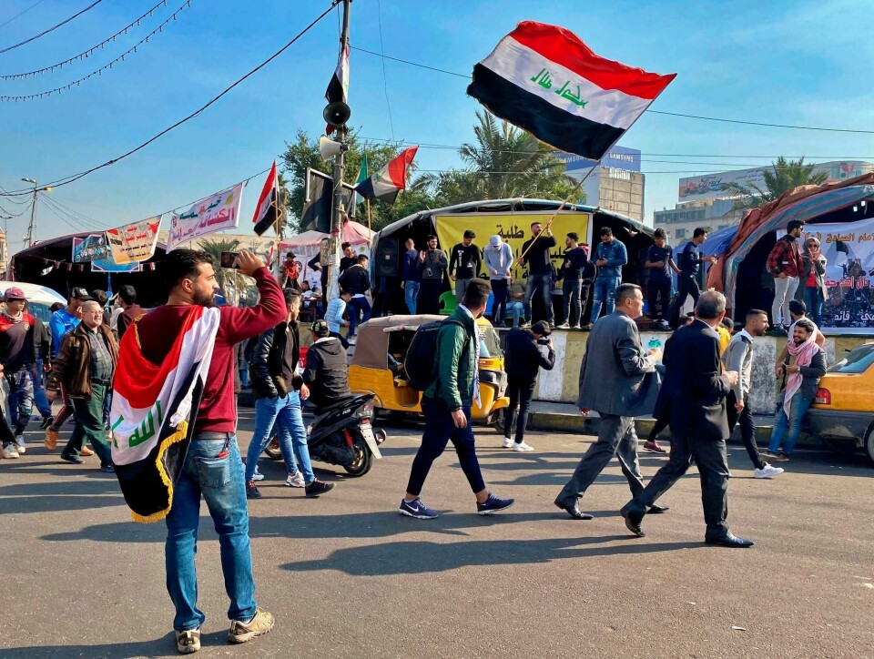 Demonstranter i Bagdad.