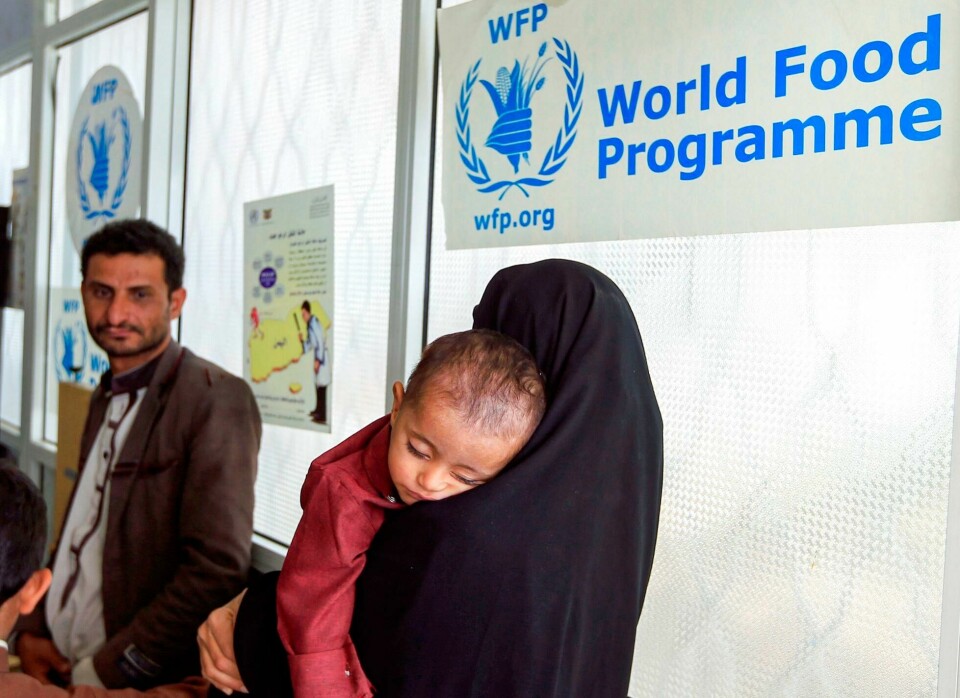 (FILES) In this file photo taken on June 22, 2019 a woman carries a child suffering from malnutrition into a treatment centre of the World Food Programme (WFP) in al-Sabeen Maternal Hospital in the Huthi-rebel-held Yemeni capital Sanaa. - The World Food Progamme (WFP) wins the 2020 Nobel Peace Prize, the Norwegian Nobel Committee has has announced on October 09, 2020. (Photo by Mohammed HUWAIS / AFP) (FILES) In this file photo taken on June 22, 2019 a woman carries a child suffering from malnutrition into a treatment centre of the World Food Programme (WFP) in al-Sabeen Maternal Hospital in the Huthi-rebel-held Yemeni capital Sanaa. - The World Food Progamme (WFP) wins the 2020 Nobel Peace Prize, the Norwegian Nobel Committee has has announced on October 09, 2020. (Photo by Mohammed HUWAIS / AFP)