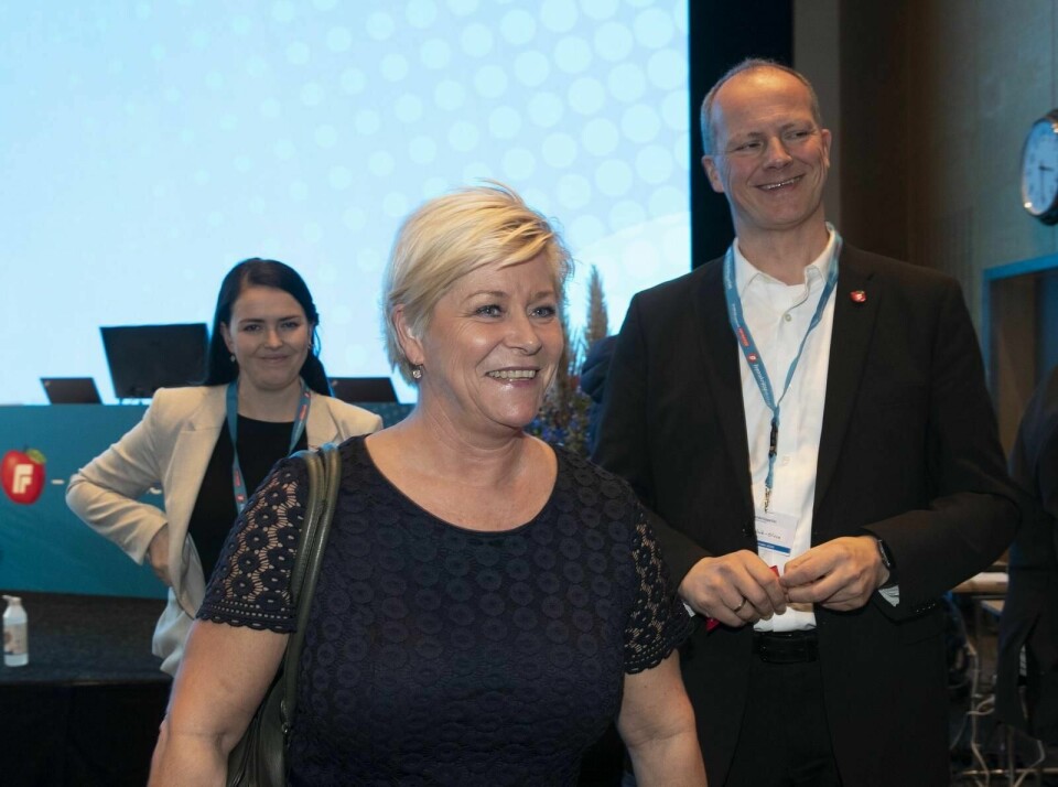 Siv Jensen og Ketil Solvik-Olsen var ikke helt enige om bruken av inne- og utestemme på helgens Frp-landsmøte. Foto: Berit Roald/NTB