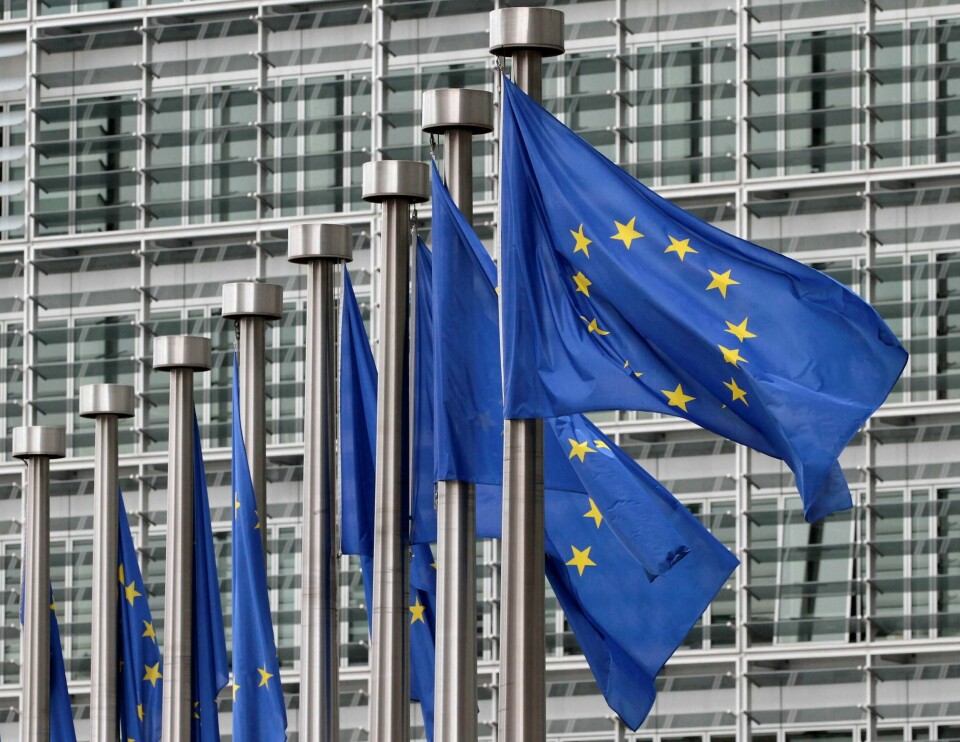 FILE - In this May 9, 2011 file photo, EU flags fly outside the European Commission headquarters in Brussels. Kathy Brison of the Belgian food safety agency said Sunday Aug. 6, 2017, that Belgian food safety authorities began investigating possible pesticide contamination in eggs in early June, several weeks before the public was made aware of a food safety scare now affecting several European countries. (AP Photo/Yves Logghe, FILE)