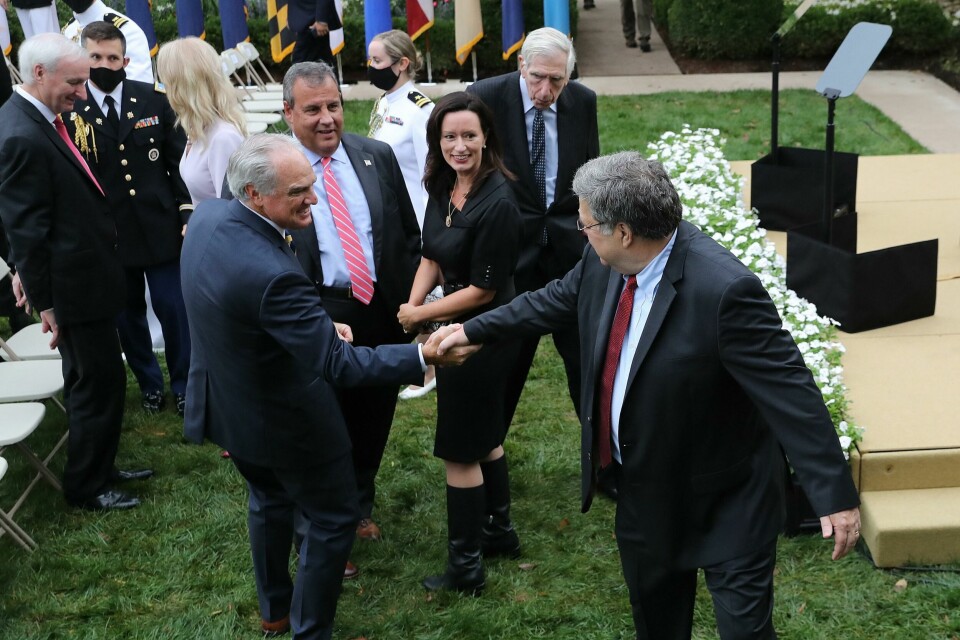 WASHINGTON, DC - SEPTEMBER 26: Attorney General William Barr (R) says goodbye to former New Jersey Governor Chris Christie and other guests after President Donald Trump introducee 7th U.S. Circuit Court Judge Amy Coney Barrett, 48, as his nominee to the Supreme Court in the Rose Garden at the White House September 26, 2020 in Washington, DC. With 38 days until the election, Trump tapped Barrett to be his third Supreme Court nominee in just four years and to replace the late Associate Justice Ruth Bader Ginsburg, who will be buried at Arlington National Cemetery on Tuesday. Chip Somodevilla/Getty Images/AFP== FOR NEWSPAPERS, INTERNET, TELCOS & TELEVISION USE ONLY == WASHINGTON, DC - SEPTEMBER 26: Attorney General William Barr (R) says goodbye to former New Jersey Governor Chris Christie and other guests after President Donald Trump introducee 7th U.S. Circuit Court Judge Amy Coney Barrett, 48, as his nominee to the Supreme Court in the Rose Garden at the White House September 26, 2020 in Washington, DC. With 38 days until the election, Trump tapped Barrett to be his third Supreme Court nominee in just four years and to replace the late Associate Justice Ruth Bader Ginsburg, who will be buried at Arlington National Cemetery on Tuesday. Chip Somodevilla/Getty Images/AFP== FOR NEWSPAPERS, INTERNET, TELCOS & TELEVISION USE ONLY ==