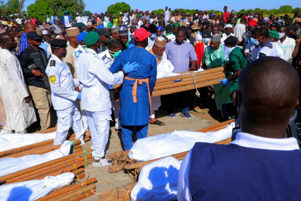 People attend a funeral for those killed by suspected Boko Haram militants in Zaabarmar, Nigeria, Sunday, Nov. 29, 2020. Nigerian officials say suspected members of the Islamic militant group Boko Haram have killed at least 40 rice farmers and fishermen while they were harvesting crops in northern Borno State. The attack was staged Saturday in a rice field in Garin Kwashebe, a Borno community known for rice farming. (AP Photo/Jossy Ola) People attend a funeral for those killed by suspected Boko Haram militants in Zaabarmar, Nigeria, Sunday, Nov. 29, 2020. Nigerian officials say suspected members of the Islamic militant group Boko Haram have killed at least 40 rice farmers and fishermen while they were harvesting crops in northern Borno State. The attack was staged Saturday in a rice field in Garin Kwashebe, a Borno community known for rice farming. (AP Photo/Jossy Ola)