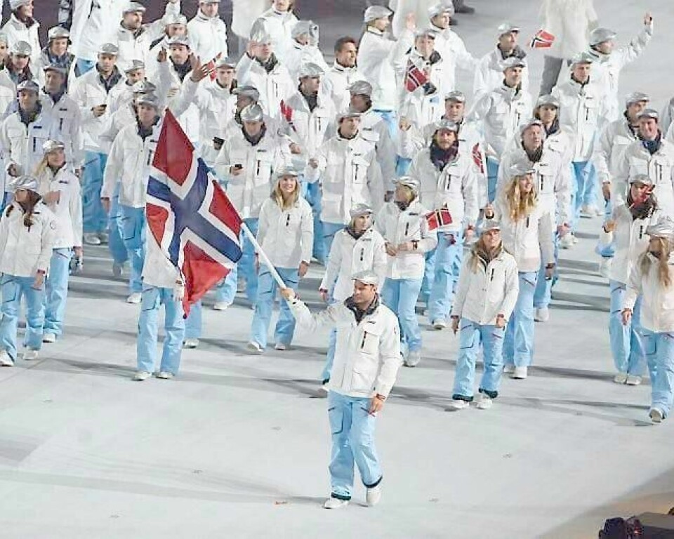 Aksel Lund Svindal i spissen for den norske troppen som flaggbærer under gårsdagens åpningsseremoni. FOTO: CLAUDIO BRESCIANI/TT/NTB SCANPIX