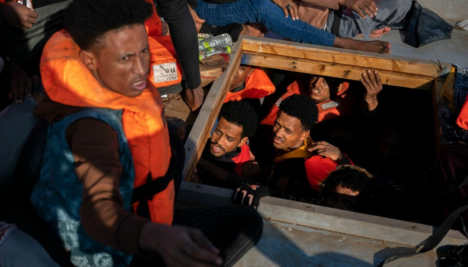 Ikke siden 2017 har så mange mennesker druknet i Middelhavet i forsøket på å nå Europa. Her er det migranter fra Eritrea, Libya og Sudan ombord på en overfylt trebåt i trøbbel. Men disse ble reddet av det spanske hjelpefartøyet Open Arms utenfor Libya 17. juni i år. Ikke siden 2017 har så mange mennesker druknet i Middelhavet i forsøket på å nå Europa. Her er det migranter fra Eritrea, Libya og Sudan ombord på en overfylt trebåt i trøbbel. Men disse ble reddet av det spanske hjelpefartøyet Open Arms utenfor Libya 17. juni i år. Foto: Joan Mateu Parra / AP / NTB