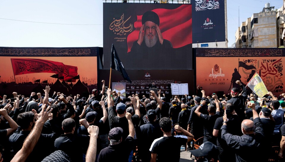 Hizbollah-leder Hassan Nasrallah holder en videoverført tale i Beirut i forbindelse med ashura. Hizbollah-leder Hassan Nasrallah holder en videoverført tale i Beirut i forbindelse med ashura. Foto: Hassan Ammar / AP / NTB
