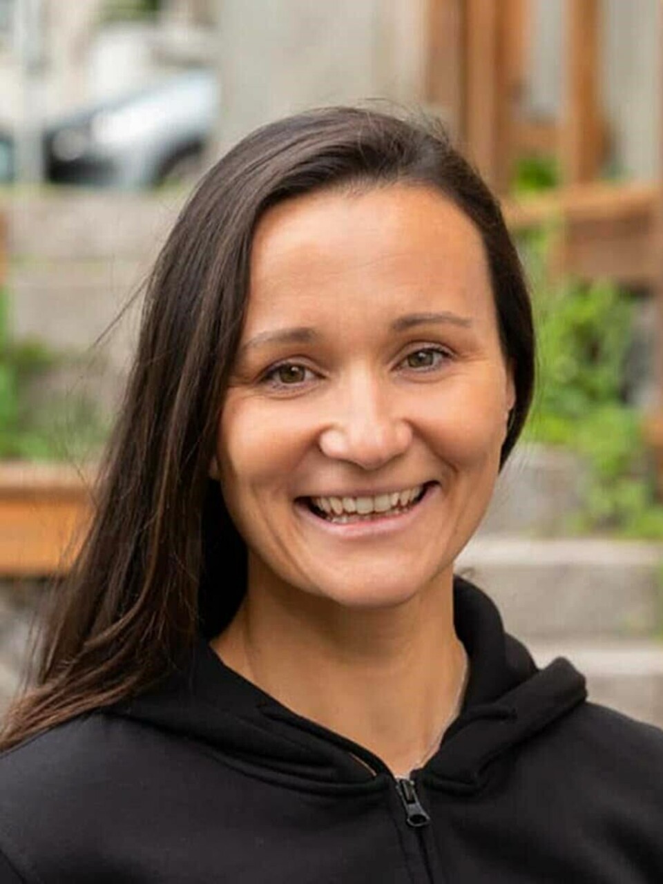 Lisa Mari Watson er daglig leder i Tverga. Kvinne brunt hår smiler