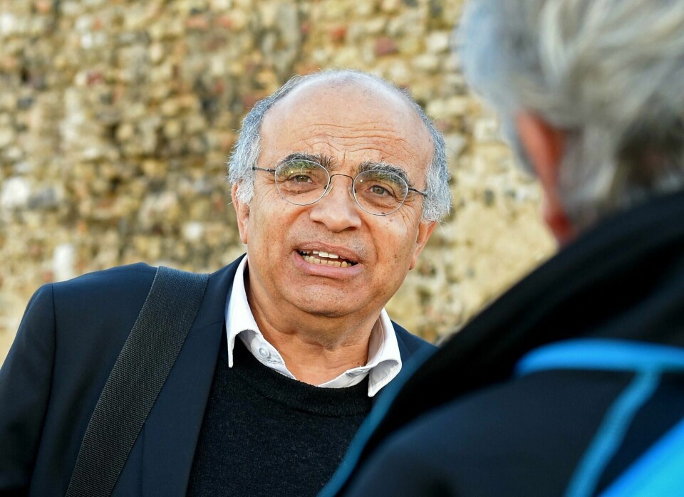 Sjefen for franske innvandringsmyndigheter, Didier Leschi. Didier Leschi, director of the 'Office francais de l'Immigration et de l'Integration' (OFII), commissioned by the Minister of the Interior, reacts at the entrance of the 'Pentecost relay', parish hall of Calais, on October 28, 2021. - He comes in Calais to dialogue with associations for the defense of migrants following a hunger strike by three activists including a priest. (Photo by FRANCOIS LO PRESTI / AFP)