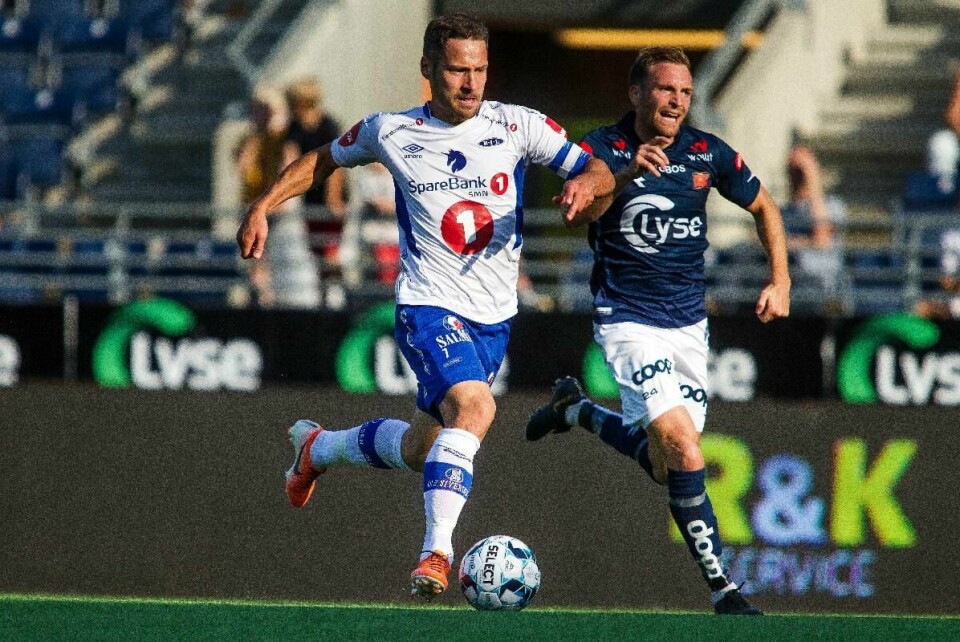 Vikings Kristoffer Løkberg i duell med Mads Reginiussen under kampen mellom Viking og Ranheim på SR-Bank Arena. Foto: Carina Johansen / NTB Scanpix