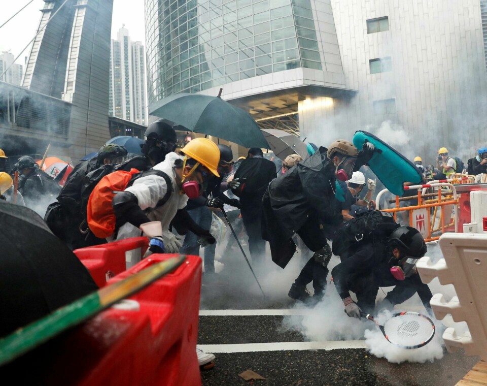 protest: Sammenstøt mellom demonstranter og politi i Hongkong forrige søndag. FOTO: NTB SCANPIX protest: Sammenstøt mellom demonstranter og politi i Hongkong forrige søndag. FOTO: NTB SCANPIX