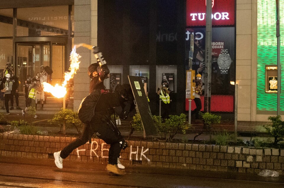 A demonstrator throws a molotov cocktail at police during a protest in Hong Kong, China August 31, 2019. REUTERS/Danish Siddiqui A demonstrator throws a molotov cocktail at police during a protest in Hong Kong, China August 31, 2019. REUTERS/Danish Siddiqui