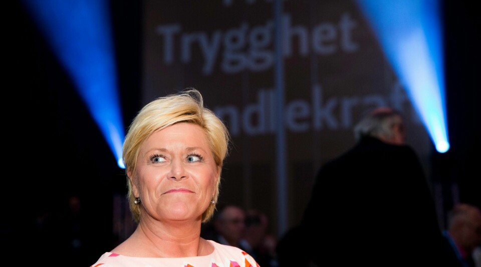 Siv Jensen har i år sittet som partileder i ti år. I helgen takker hun ja til to nye år. I dagens tale vil hun sparke sine egne på leggen, og oppfordre dem til å tenke nytt når Frps partiprogram fra 2017 skal meisles ut. FOTO: Berit Roald/NTB SCANPIX