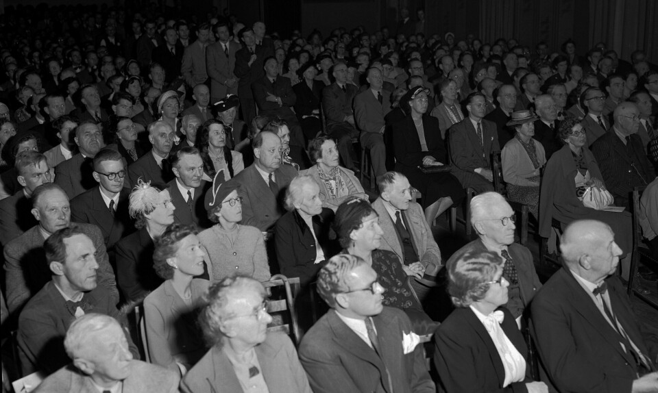 1952: Møtene i organisasjonen Libertas i Ingeniørenes hus i Oslo samlet alltid mye folk. Libertas kjempet mot de såkalte tvanslovene og regjeringens pris- og rasjonaliseringslover, står det i bildeteksten til dette arkivbildet fra 1952.FOTO: NTB SCANPIX