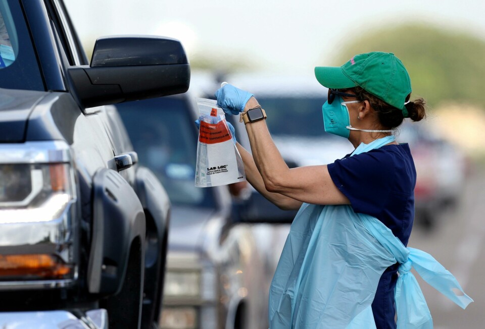 Health officials and members of the military assist during COVID-19 testing, Wednesday, July 8, 2020, at HEB Park in Edinburg, Texas. (Delcia Lopez/The Monitor via AP) Health officials and members of the military assist during COVID-19 testing, Wednesday, July 8, 2020, at HEB Park in Edinburg, Texas. (Delcia Lopez/The Monitor via AP)