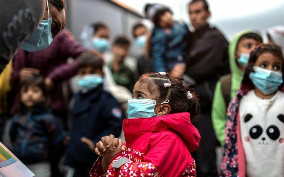 20.000 flyktninger oppholder seg i Moria-leiren i dag, selv om det er beregnet for maks 3.000. Bildet er fra i mai da greske myndigheter flyttet 400 flyktninger fra øya Lesbos til fastlandet for å spre dem.