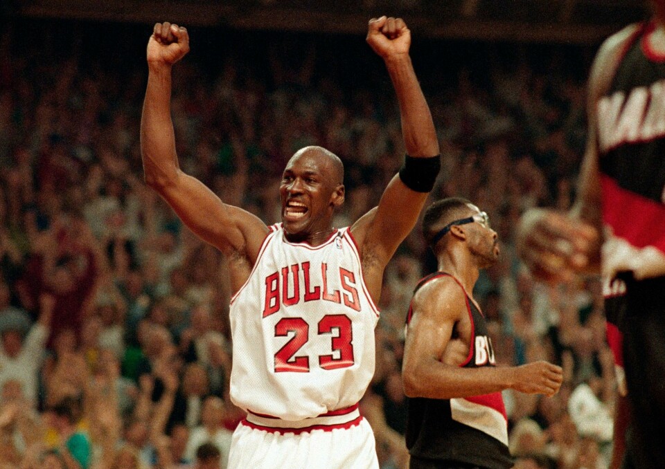 FILE - In this June 14, 1992, file photo, Michael Jordan celebrates the Bulls win over the Portland Trail Blazers in the NBA Finals in Chicago. Decades after Jordan's groundbreaking departure from college, March Madness and the NBA's mega-millions have taken all the novelty out of leaving early for the pros. (AP Photo/John Swart, File) FILE - In this June 14, 1992, file photo, Michael Jordan celebrates the Bulls win over the Portland Trail Blazers in the NBA Finals in Chicago. Decades after Jordan's groundbreaking departure from college, March Madness and the NBA's mega-millions have taken all the novelty out of leaving early for the pros. (AP Photo/John Swart, File)