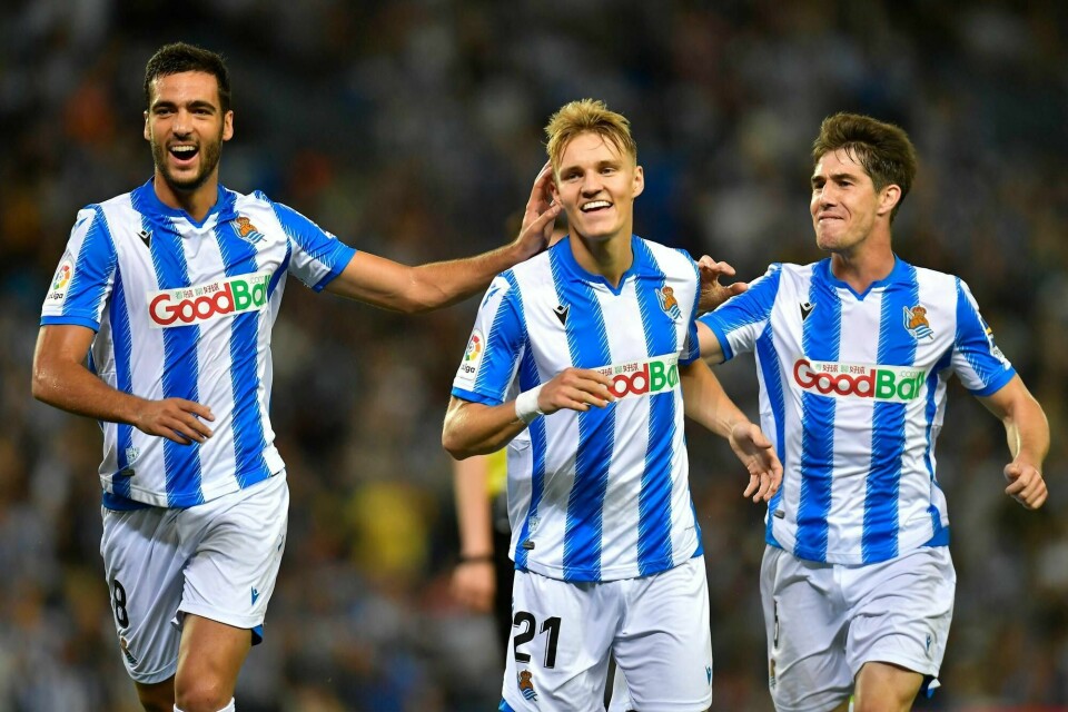 Martin Ødegaard og hans lagkamerater kunne smile til slutt, da deres poeng borte mot Atletico Madrid var nok til å sikre spill i neste sesongs Europa League.
