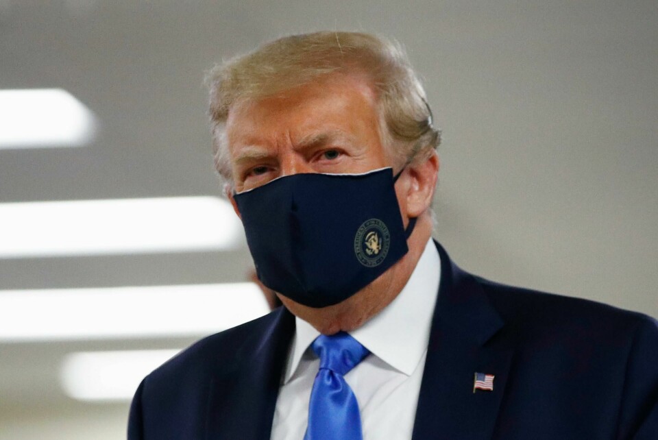 FILE - In this July 11, 2020, file photo President Donald Trump wears a face mask as he walks down a hallway during a visit to Walter Reed National Military Medical Center in Bethesda, Md. On Tuesday, July 21, Trump professed a newfound respect for the protective face masks he has seldom worn. Whether you like the mask or not, they have an impact,' he said. 'Im getting used to the mask, he added, pulling one out after months of suggesting that mask-wearing was a political statement against him. (AP Photo/Patrick Semansky, File) FILE - In this July 11, 2020, file photo President Donald Trump wears a face mask as he walks down a hallway during a visit to Walter Reed National Military Medical Center in Bethesda, Md. On Tuesday, July 21, Trump professed a newfound respect for the protective face masks he has seldom worn. Whether you like the mask or not, they have an impact,' he said. 'Im getting used to the mask, he added, pulling one out after months of suggesting that mask-wearing was a political statement against him. (AP Photo/Patrick Semansky, File)