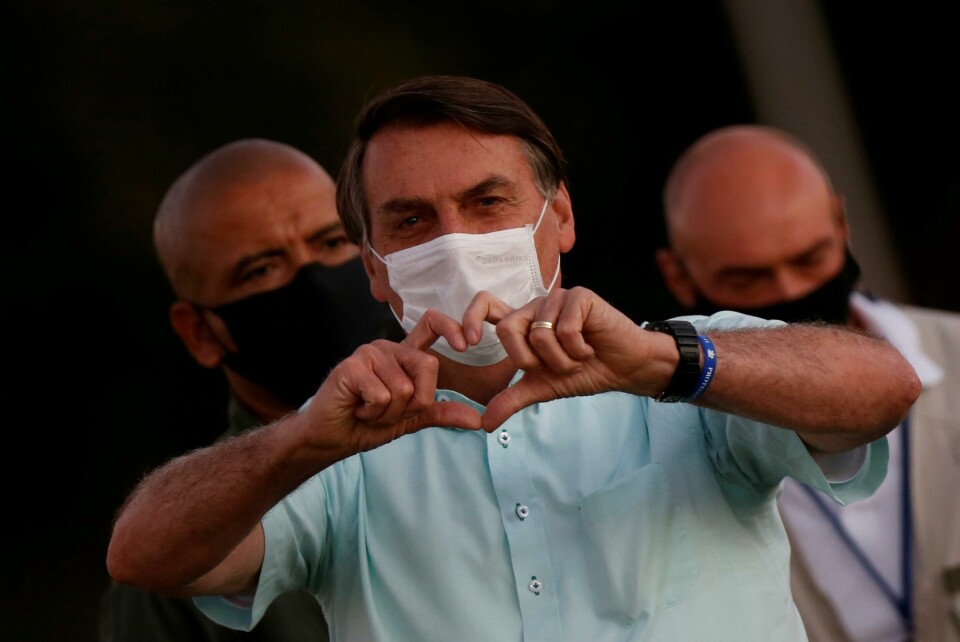 Brazil's President Jair Bolsonaro gestures while meeting supporters during a ceremony of lowering the national flag for the night, amid the coronavirus disease (COVID-19) outbreak, at the Alvorada Palace in Brasilia, Brazil, July 22, 2020. REUTERS/Adriano Machado TPX IMAGES OF THE DAY Brazil's President Jair Bolsonaro gestures while meeting supporters during a ceremony of lowering the national flag for the night, amid the coronavirus disease (COVID-19) outbreak, at the Alvorada Palace in Brasilia, Brazil, July 22, 2020. REUTERS/Adriano Machado TPX IMAGES OF THE DAY
