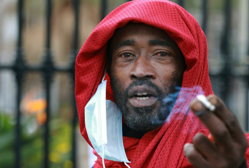 In this June 2, 2020 photo, a demonstrator smokes, during a protest against the tobacco ban outside parliament in Cape Town, South Africa. An effort to lift South Africas ban on cigarette sales during the countrys coronavirus lockdown has failed. The High Court in the capital, Pretoria, on Friday dismissed a bid by the Fair Trade Independent Tobacco Association, which represents smaller manufacturers. (AP Photo/Nardus Engelbrecht) In this June 2, 2020 photo, a demonstrator smokes, during a protest against the tobacco ban outside parliament in Cape Town, South Africa. An effort to lift South Africas ban on cigarette sales during the countrys coronavirus lockdown has failed. The High Court in the capital, Pretoria, on Friday dismissed a bid by the Fair Trade Independent Tobacco Association, which represents smaller manufacturers. (AP Photo/Nardus Engelbrecht)