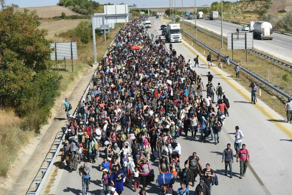 Syrian migrants and refugees march towards Greece border along a highway on September 18, 2015, on their way to the border between Turkey and Greece. Around 1,000 refugees remained stranded September 16 in the northwestern Turkish city of Edirne, near the Greek border, after being barred by Turkish authorities from continuing their journey to Europe. AFP PHOTO/BULENT KILIC Syrian migrants and refugees march towards Greece border along a highway on September 18, 2015, on their way to the border between Turkey and Greece. Around 1,000 refugees remained stranded September 16 in the northwestern Turkish city of Edirne, near the Greek border, after being barred by Turkish authorities from continuing their journey to Europe. AFP PHOTO/BULENT KILIC