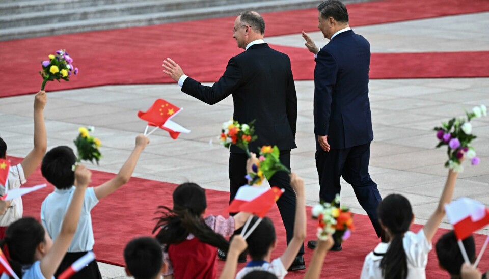 Kinas president Xi Jinping og Polens president Andrzej Duda på vei inn til Folkets store hall. Kinas president Xi Jinping og Polens president Andrzej Duda på vei inn til Folkets store hall. Foto: Pedro Pardo / Pool Photo via AP / NTB