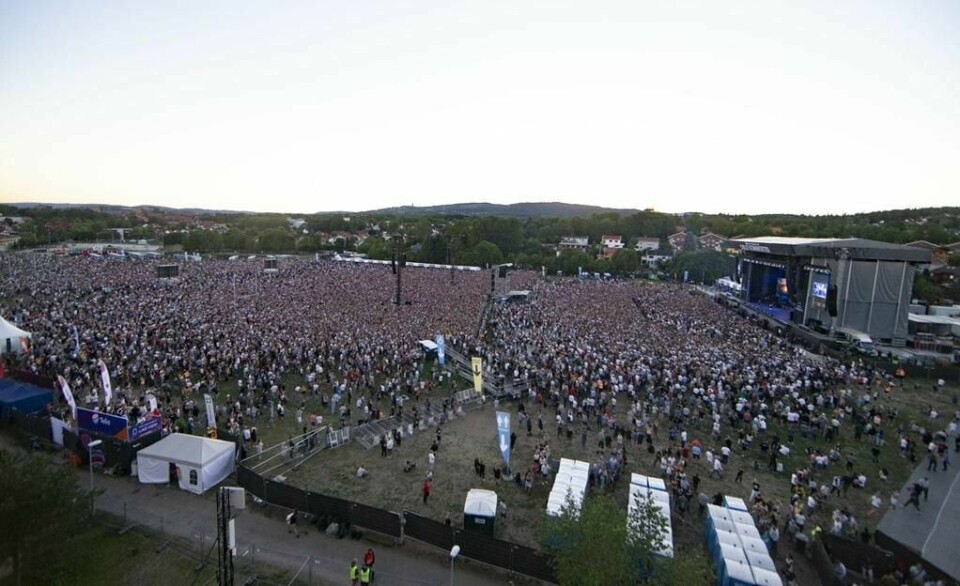 Pressefotografer ble nektet adgang til festivalområdet på Voldsløkka en time før Eminem gikk på scenen i sommer. NTB Scanpix tok dette bildet utenfra.