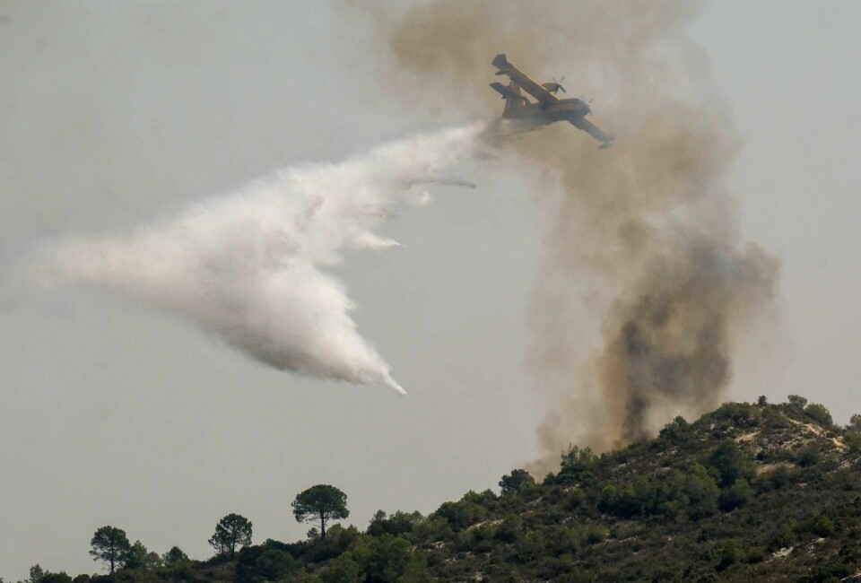 FULL FYR: Omfattende skogbranner har herjet over hele Europa i sommer. Her fra et område utenfor Valencia i Spania. FOTO: HEINO KALLS/NTB SCANPIX