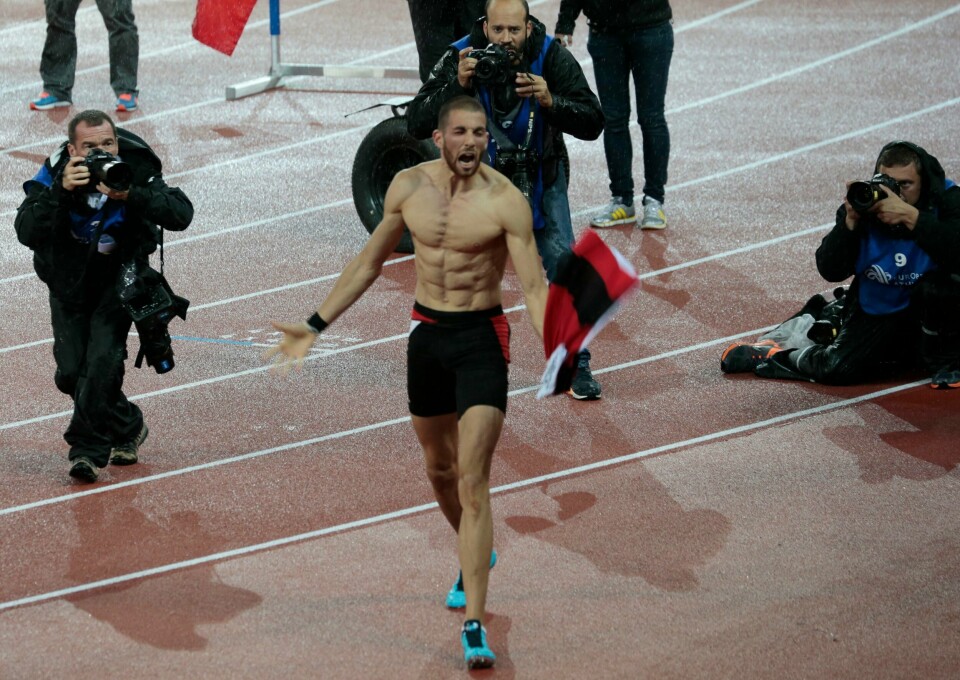 Kariem Hussein fra Sveits jubler etter at han tok gull på 400 meter hekk i EM i friidrett i 2014. Kariem Hussein fra Sveits jubler etter at han tok gull på 400 meter hekk i EM i friidrett i 2014. Foto: Lise Åserud / NTB