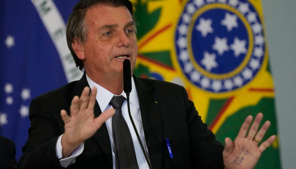Brasils president Jair Bolsonaro. Foto: Eraldo Peres / AP / NTB President Jair Bolsonaro under et folkemøte ved presidentpalasset i in Brasilia.Foto: AP / NTB